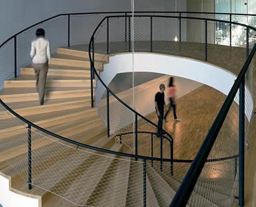 Stainless steel ferrule rope mesh is installed as the balustrade of a circle stair.